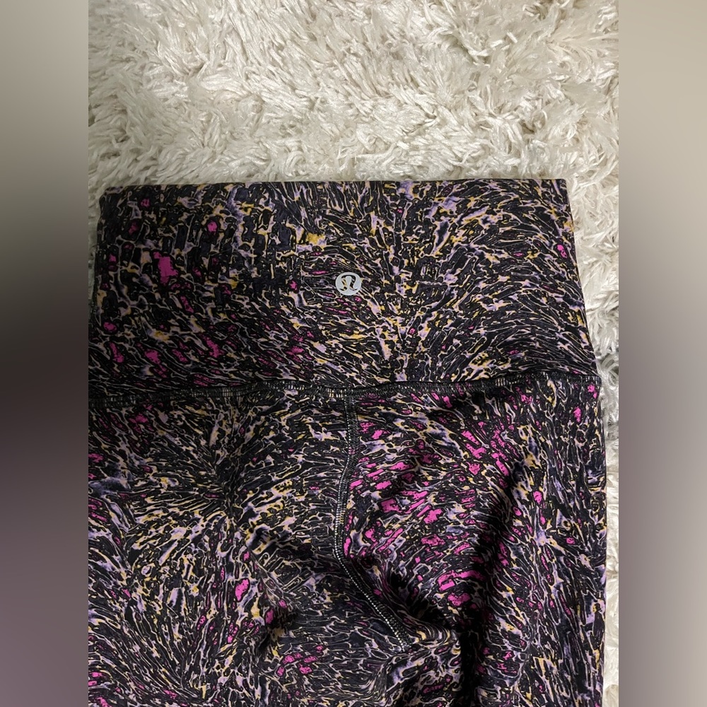 Lululemon size 2 leggings, multicolored in very good condition.